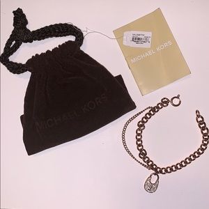 Brand New Michael Kors charm bracelet